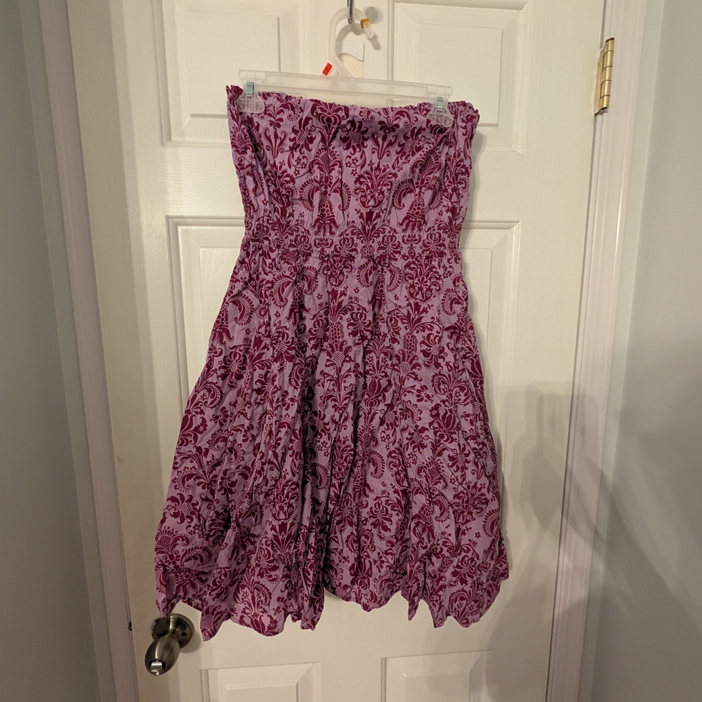 Purple Strapless Dress with Floral Pattern.